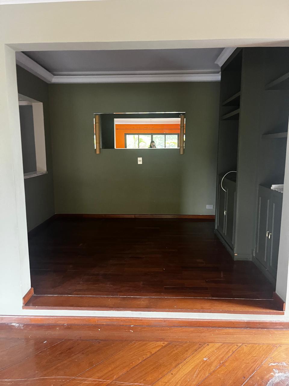 Antes: Sala flexível (TV / escritório / hóspedes)